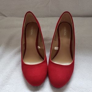 Cherry red round toe pumps